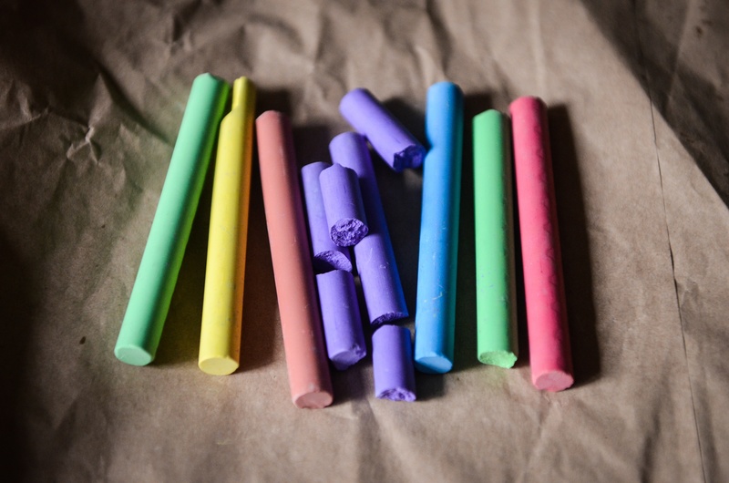 Colored chalk lies in a neat pile 